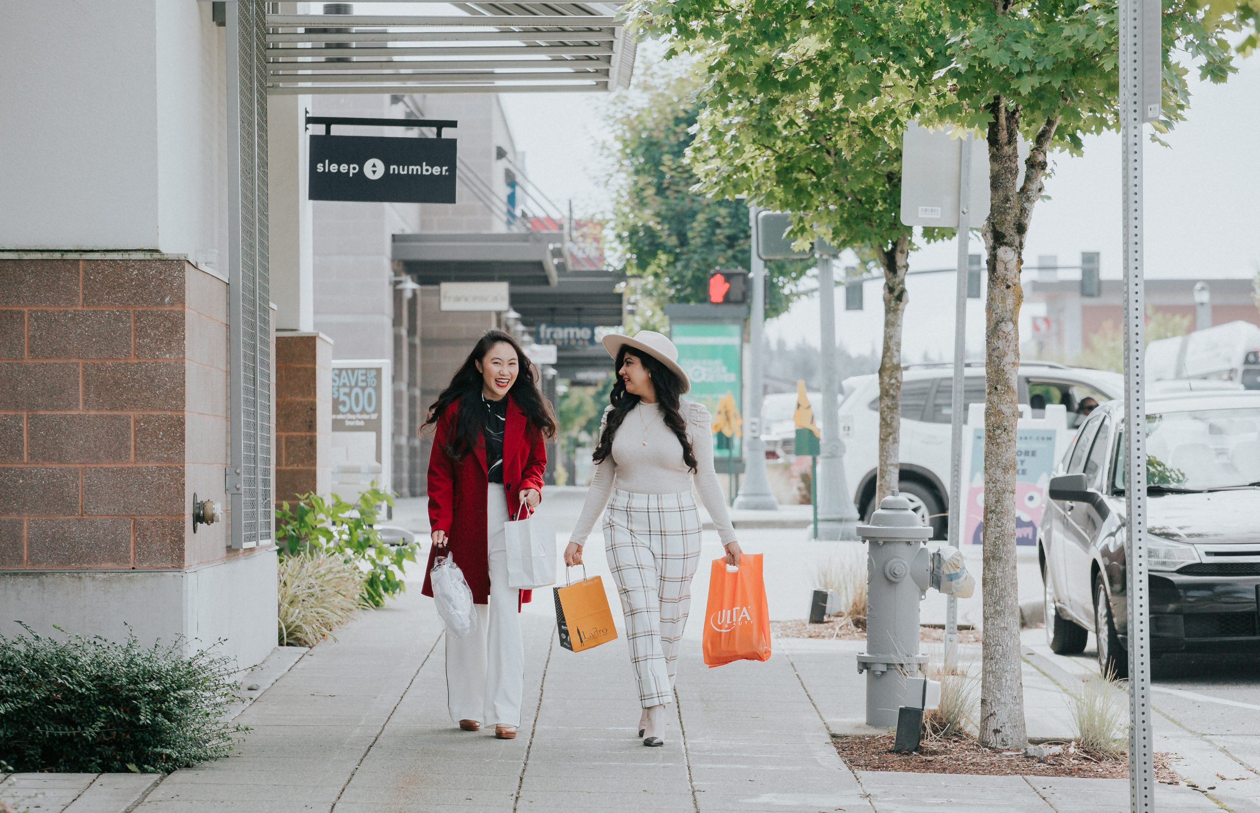 two women shopping at Grand Ridge Plaza
