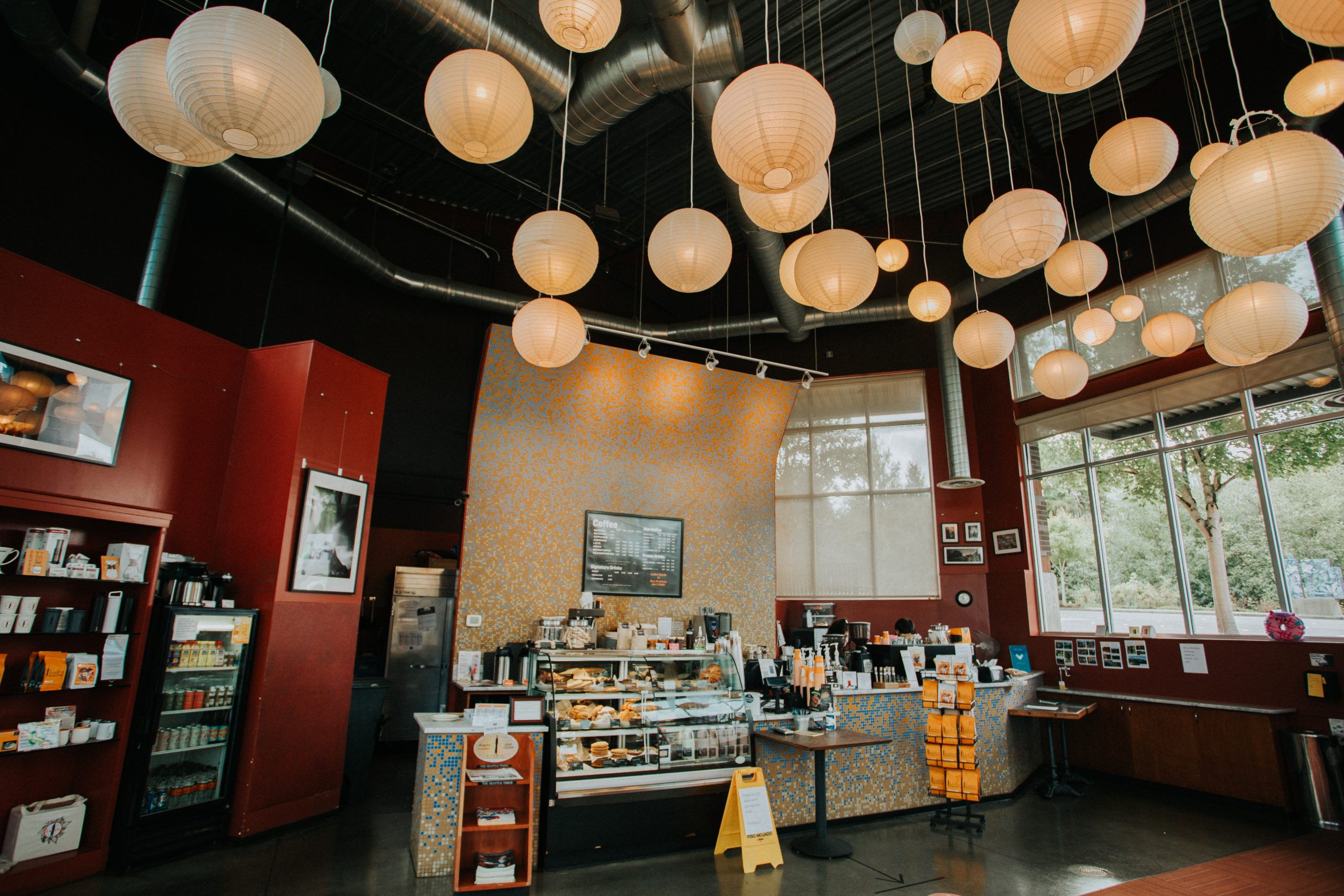 Rice paper lights hanging from ceiling of store